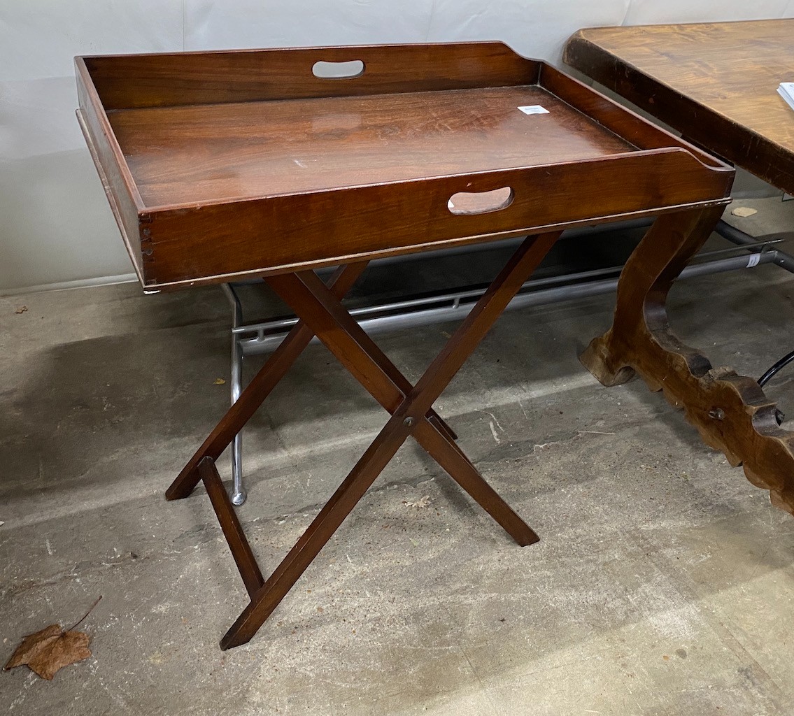 A Victorian style rectangular mahogany butler's tray on folding stand, width 74cm, depth 49cm, height 79cm